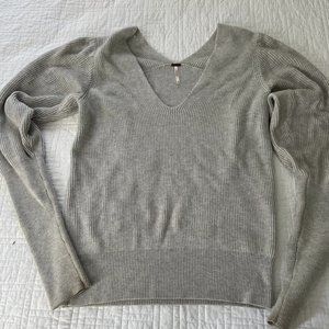 Free People grey sweater with "puffy" shoulder. Size medium